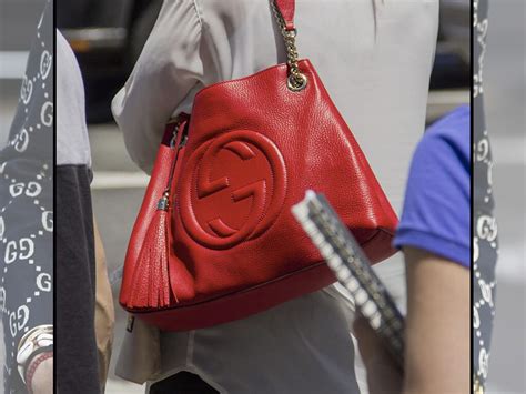 como saber si es gucci original|autenticación de bolsa Gucci.